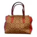 Cartera de cuero café con rojo